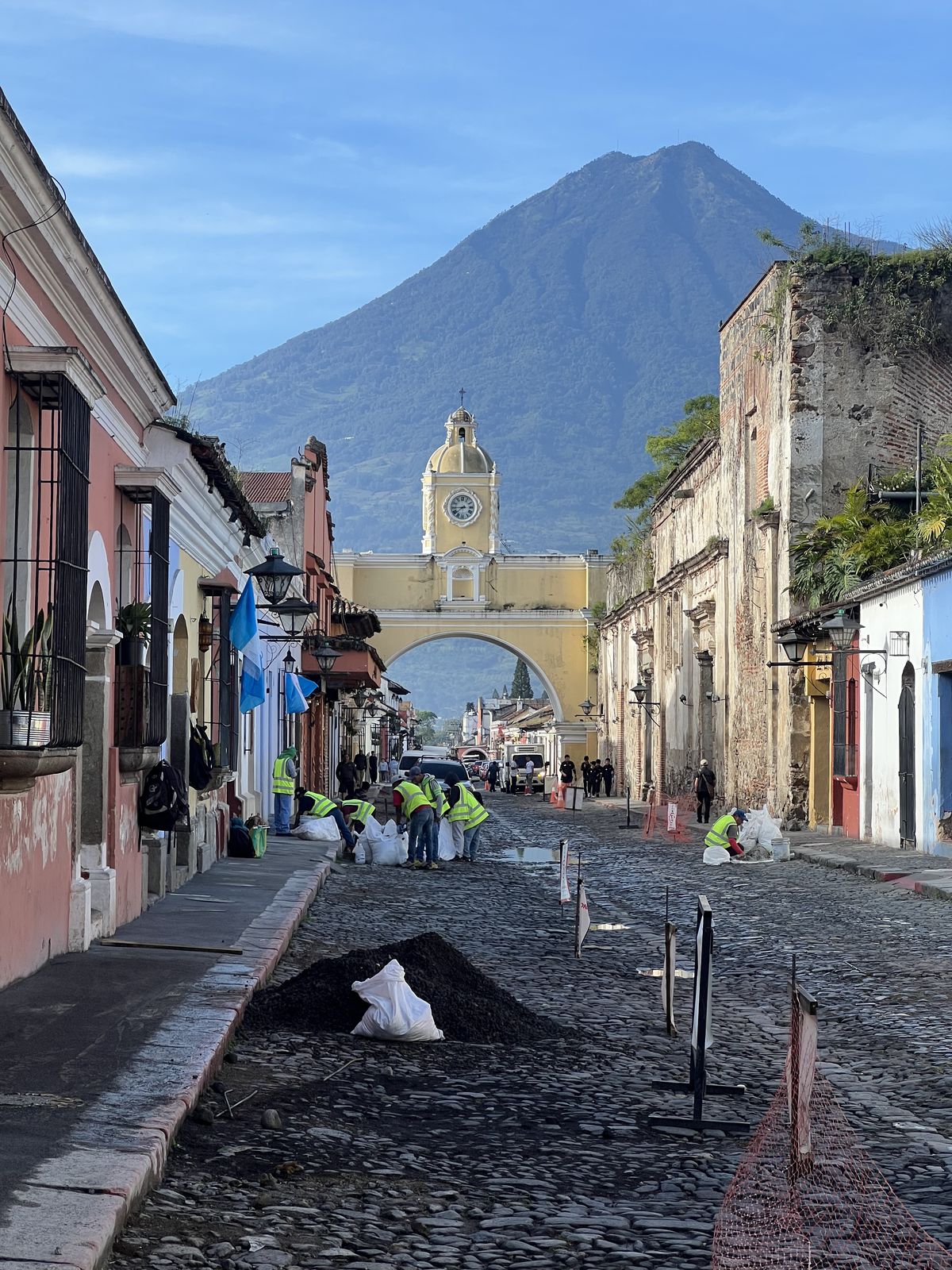Antigua Guatemala street with Santa Catalina Arch and Volcán de Agua