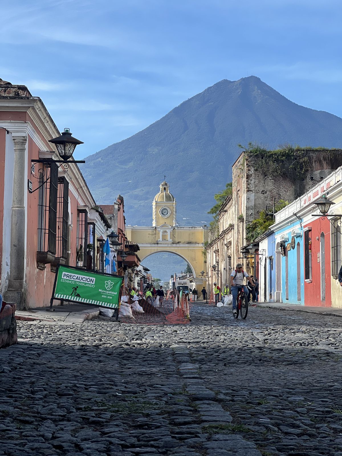 Antigua Guatemala cobblestone streets with volcano backdrop
