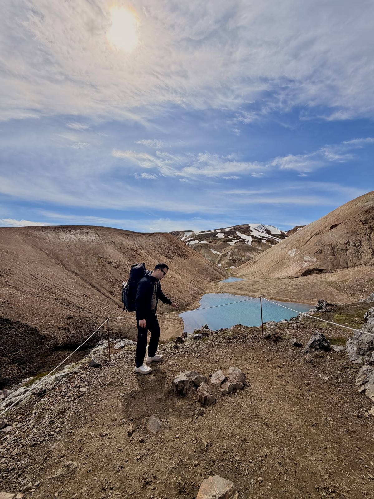 Bright blue geothermal pool along the Laugavegur Trail